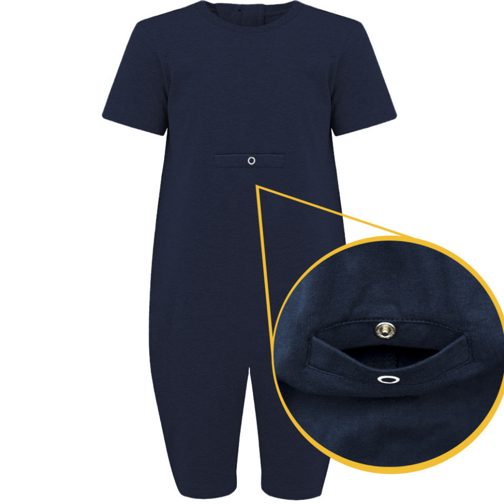 Navy blue j with a close-up of a pocket on a white background the pocket is for tube feeding 