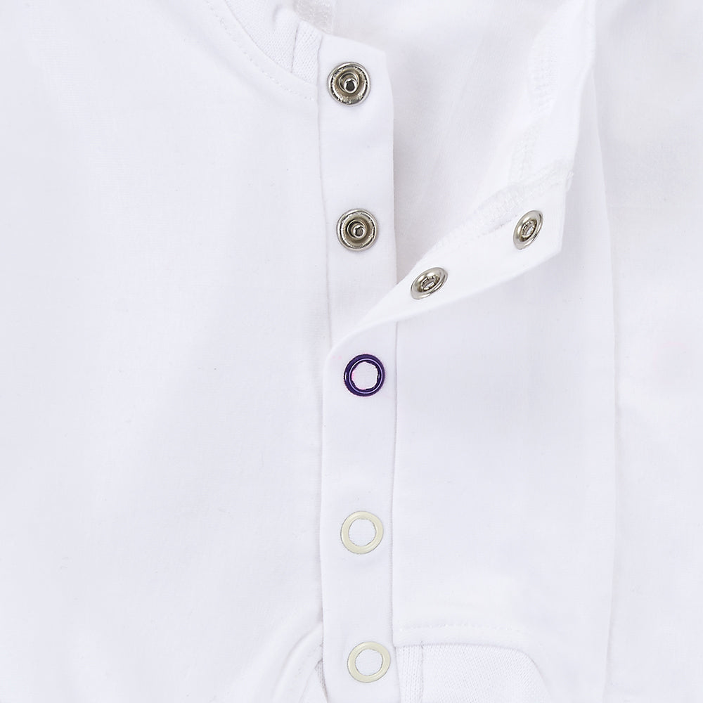 Close-up of the popper crotch with one purple popper to help align the poppers correctly 