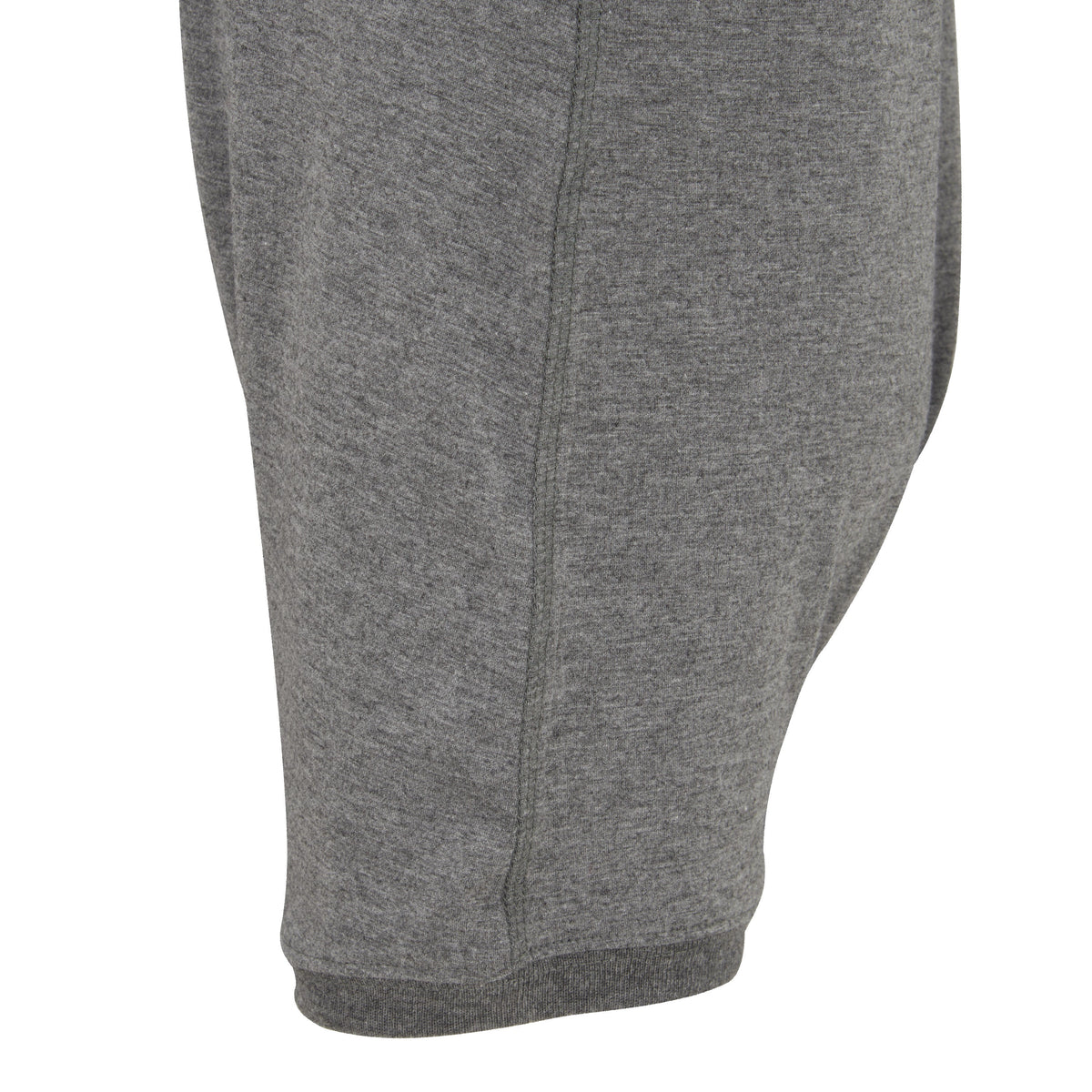 Close up of the leg of the grey garment with a white backround 