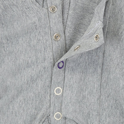 Close-up of a the grey with the inside poppers 