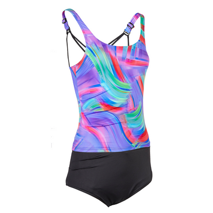 A tankini swimsuit with a vibrant indigo wave pattern and black briefs, designed for ladies with incontinence issues, featuring adjustable straps and a high-waisted brief.