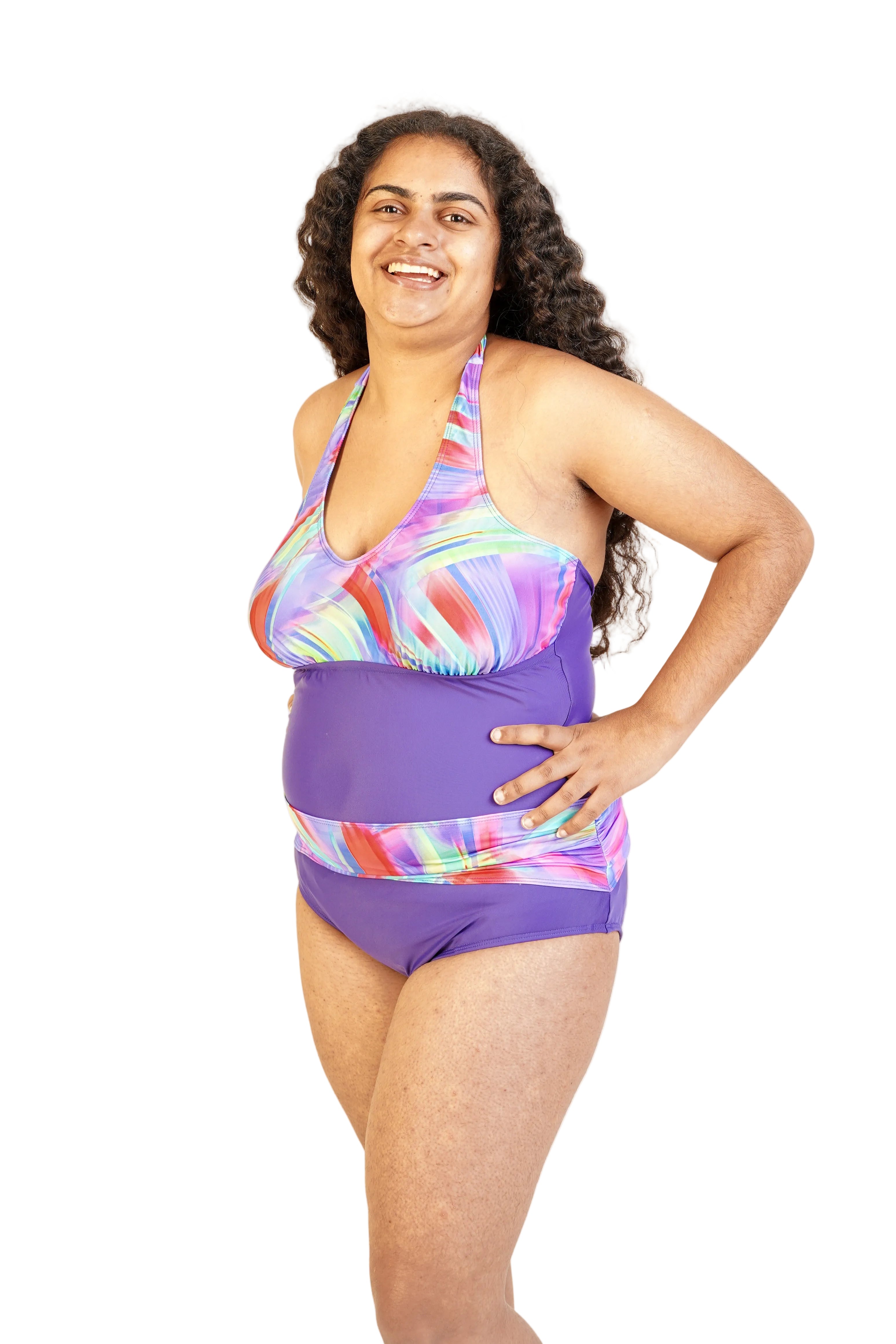 Model wearing Kes-Vir Women’s Sash Incontinence Swimsuit in Indigo Wave, showing fit and coverage.